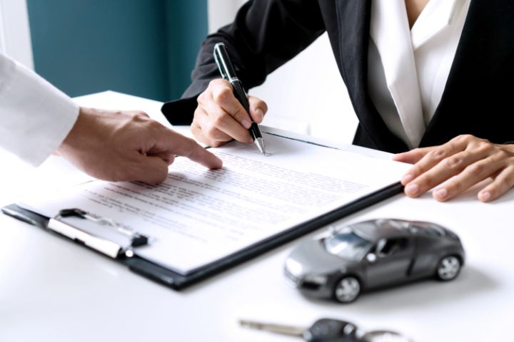 Finalizing Paperwork And Payment for a used car